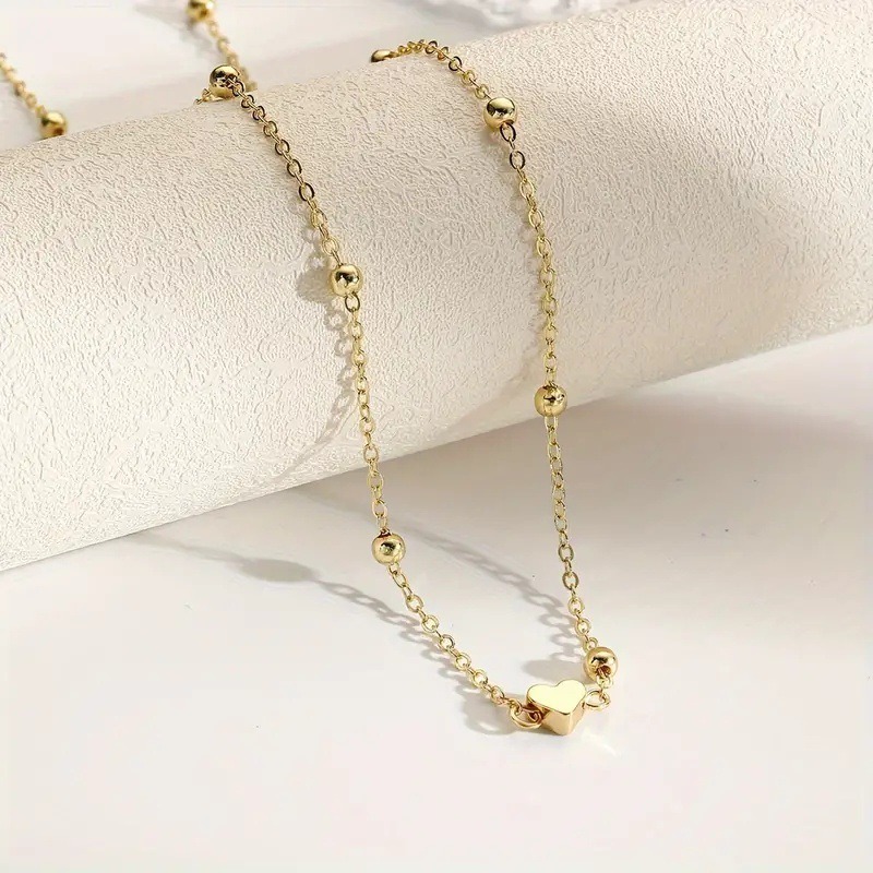 Delikatny złoty łańcuszek na t – Body Jewelry Women recenzja i cena